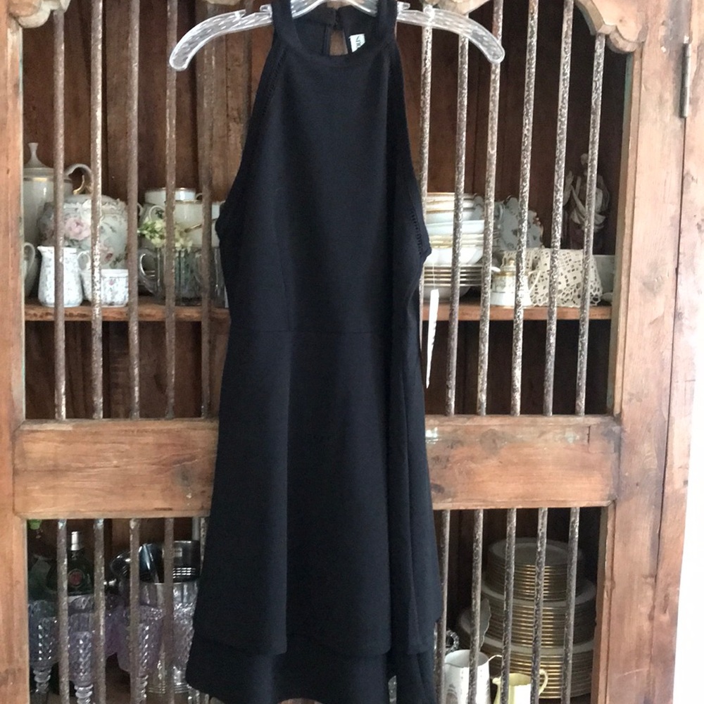 Black Juniors Dress NWT Size XL. Needs small repair